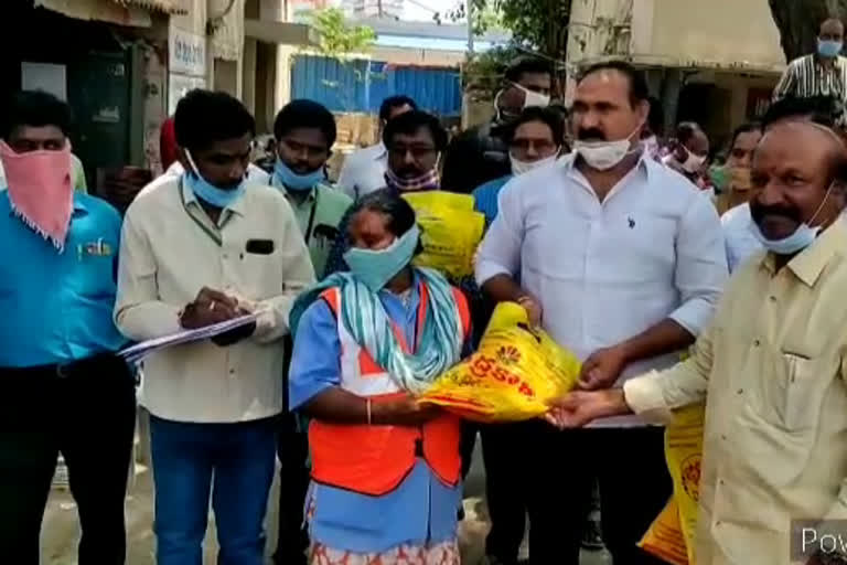 new cloths are distributed to the municipality workers by the mla bollam malliah in suryapeta