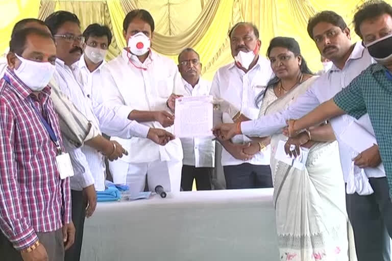 Revenue Employees  giving application to minister mopidevi