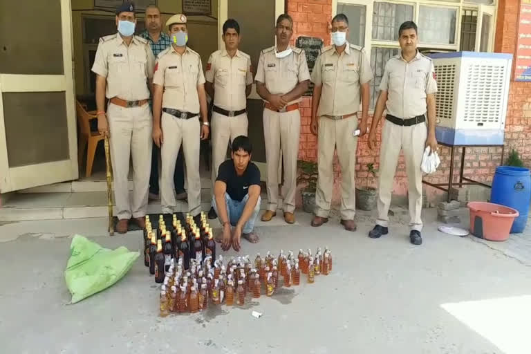 illegal liquor vendor caught by police