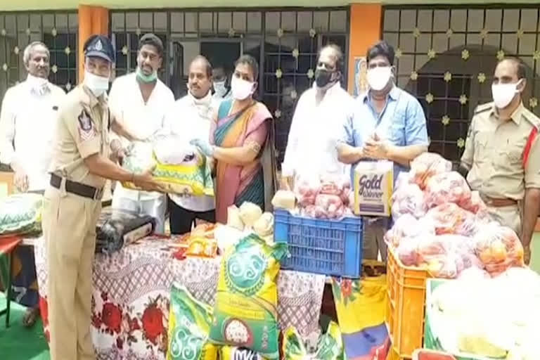 MLA roja distributes essential commodities to the police at puthuru in chittoor