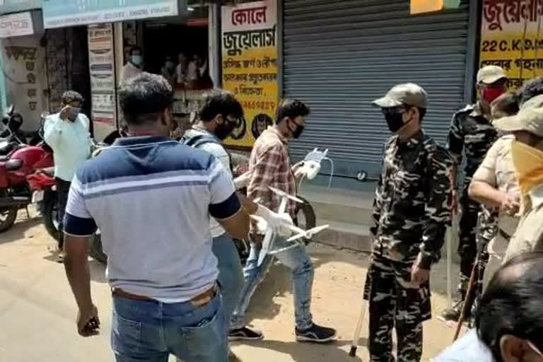 police petroling and watching through drone camera to maintain lockdown in aarambagh, hoogly