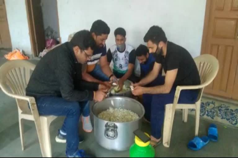 Social workers giving food to poor