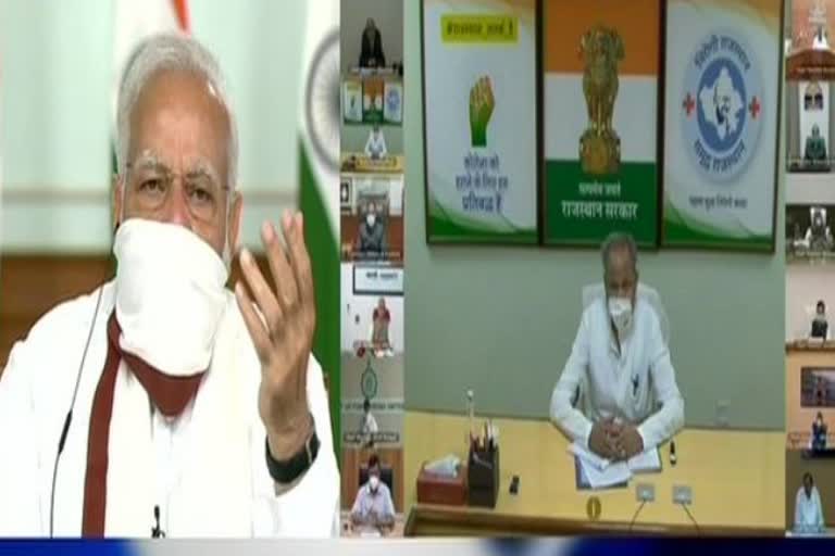 pm modi wears home made mask at video conference with cms