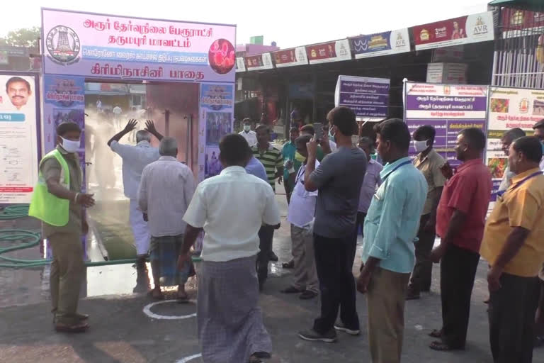 disinfectant spray tunnel in dharmapuri temporary market