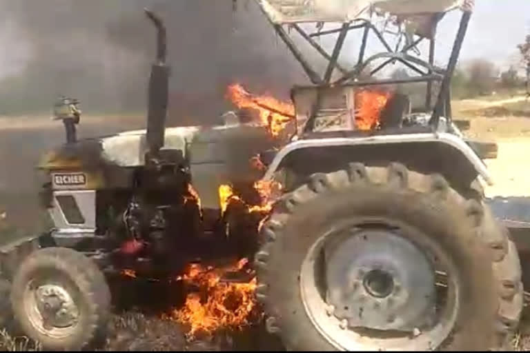 tractor catches fire in wheat field of agar