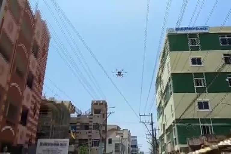 Hydrochloride solution spray with drone in red zone areas  in  mangalagiri