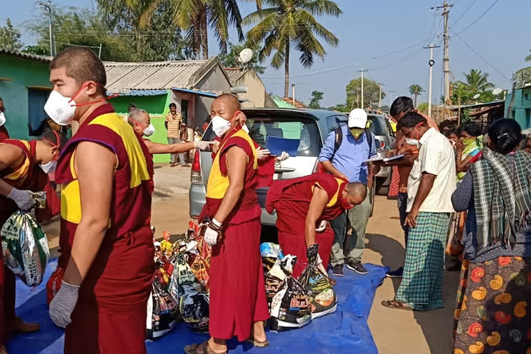 Distribution of food kit from Tibetan camp