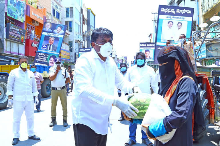 srikalahasti mla distributes essential goods to poor