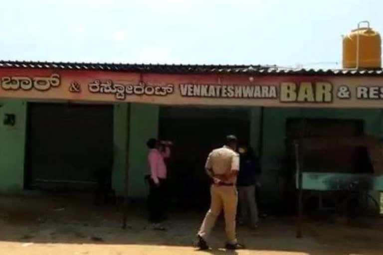 Alcohol theft at a bar in nelmangala