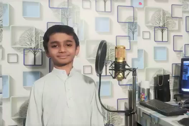 9 year old boy sing a song on corona