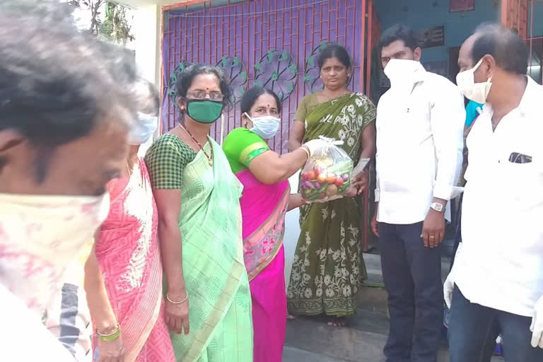 essential commodities distributes to poor people in achanta