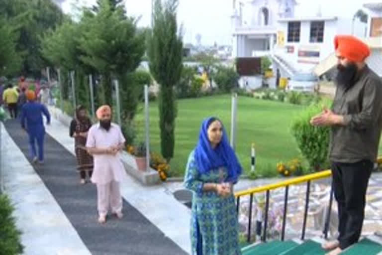 Few people offer prayers at Gurudwara