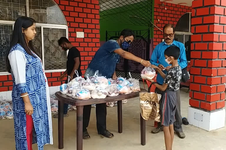 a couple donated relief among needy people