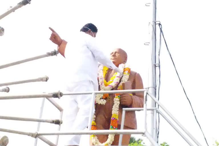 tanuku mla garlands to ambedkar statue on behalf of anniversary