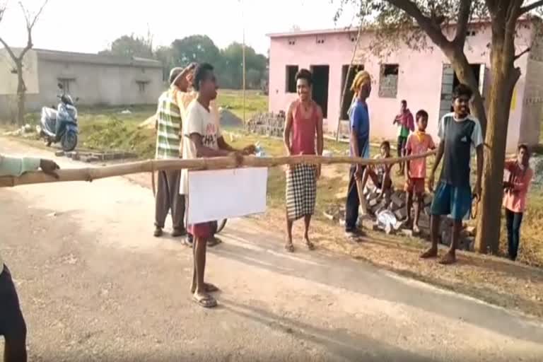 The village main road closed by villagers