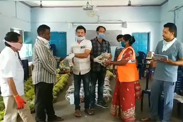 Distribution of vegetables to sanitation staff of Narsipatnam