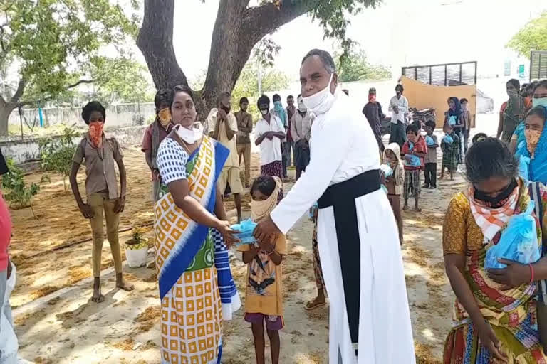 Believers Church Father distributed food items at mahabubabad district