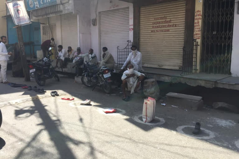 There is a crowd outside the banks in Ratlam