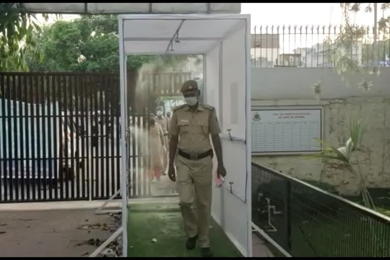 automatic sanitizer machine is installed at rajouri garden police station in delhi