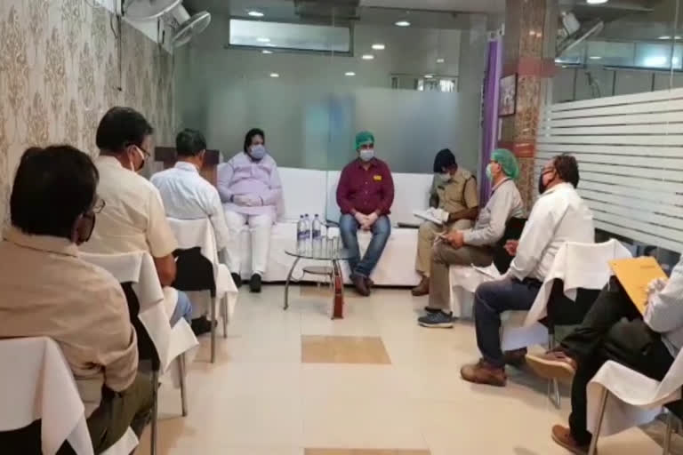 mla and officers during meeting