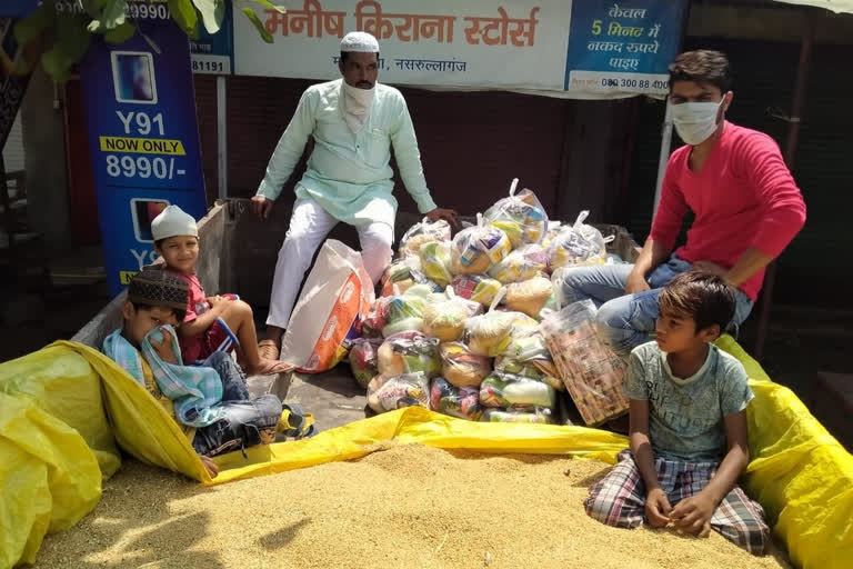 Abdullah Khan distributing ration items to 91 poor families IN Sehore