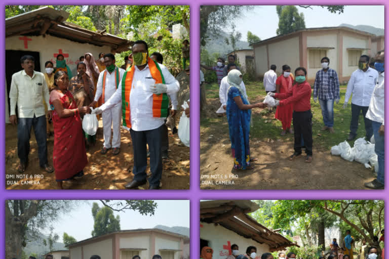 bjp leaders distribute modi kits to tribals of vizag agency areas