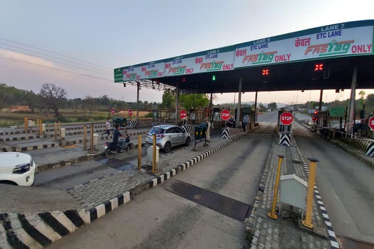 security checking vehicles at toll plaza