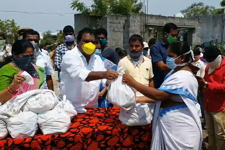 MLA Aroori Ramesh distributes essential commodities to poor people in Vardhanpet, Warangal rural district