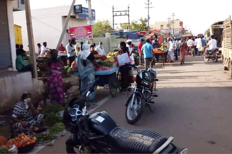 The social distance in vegetable market of Muddebihala is disappearing