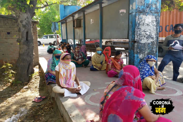 Women wandering for ration in Noida