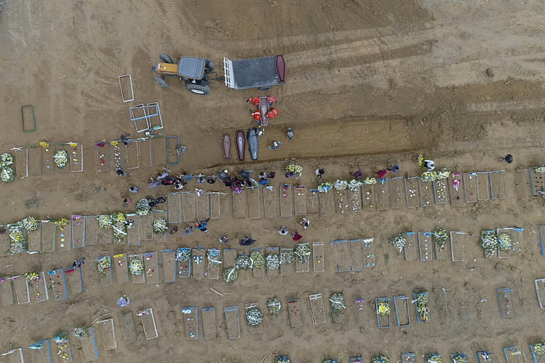 Dozens of coffins were taken to a public cemetery in Manaus, northwest Brazil, on Wednesday.