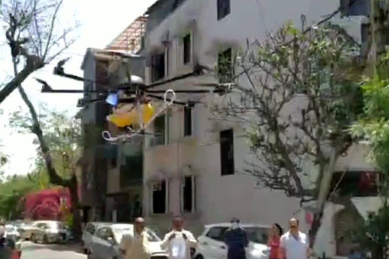 big buildings of janakpuri getting sanitized by drone in delhi