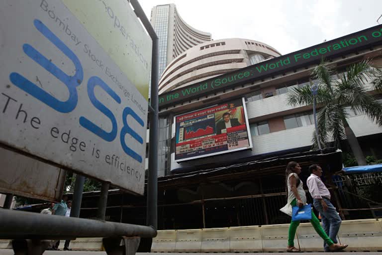 sensex jumps over 483 points nifty tops 9300