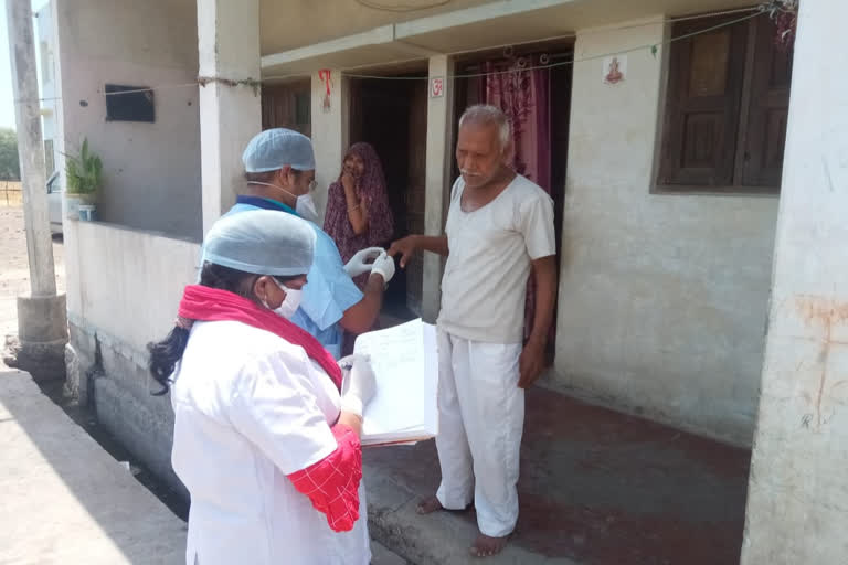 health department team is doing door to door check up of corona virus in sehore