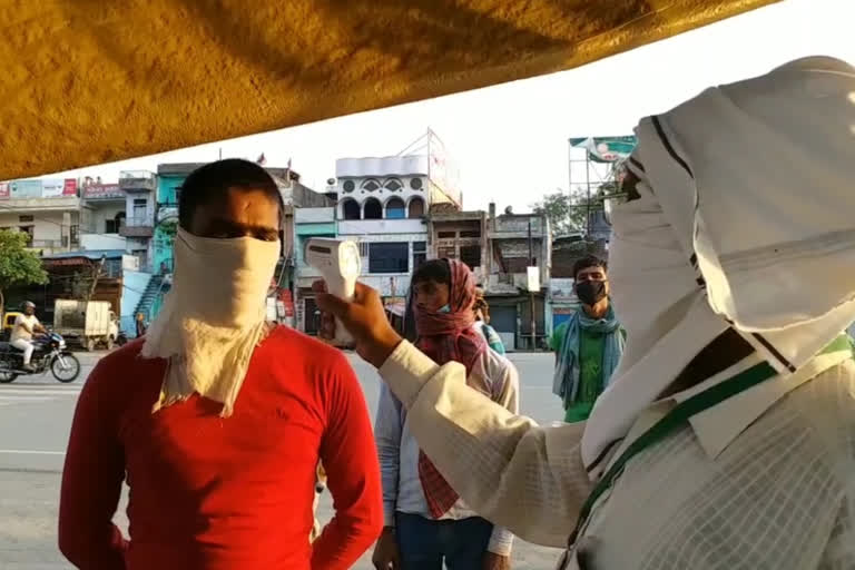 Hundreds of people underwent thermal screening in varanasi