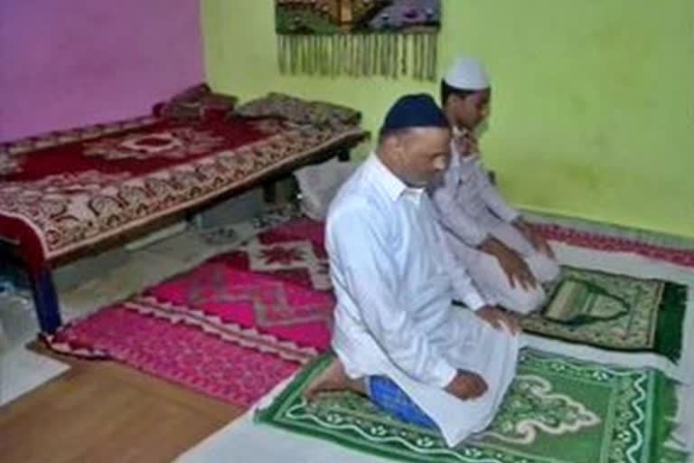 People offer prayers at home during Ramzan