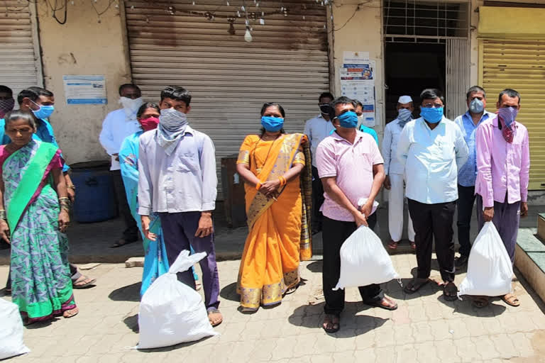 Pune Corporation free distribution of food grains to Physically disable peeson