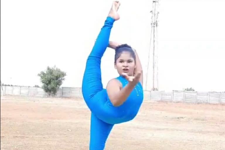 Student performing yoga