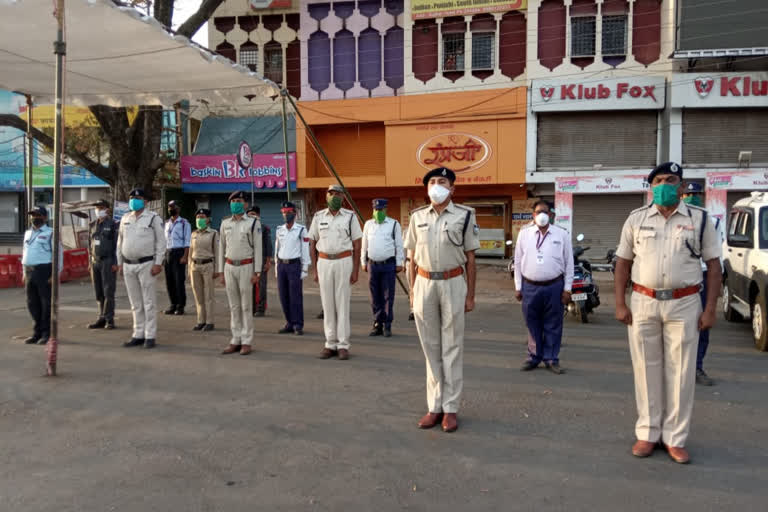 Police from across the district stood and performed the national anthem together