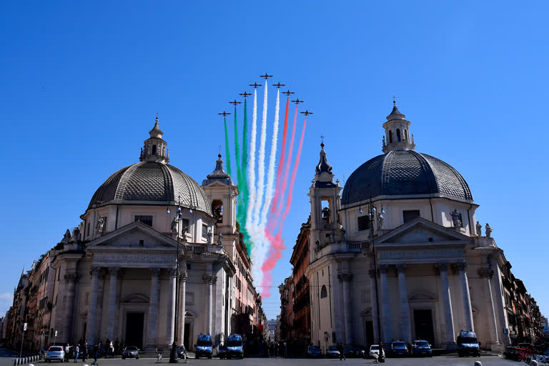 Italy's special acrobatic air force unit flew over Rome on Saturday to celebrate Liberation Day, spreading the colours of the Italian flag across the sky.