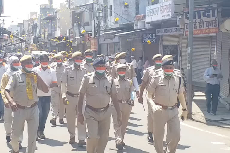 bharatpur news, Traders and police flag march, corona virus