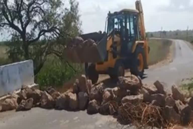 difficulties in travelling while rocks on roads pedanandipadu guntur district