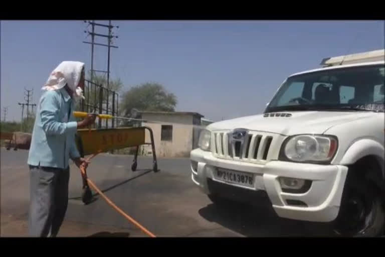 Vehicles being sanitized at checkposts to prevent corona infection