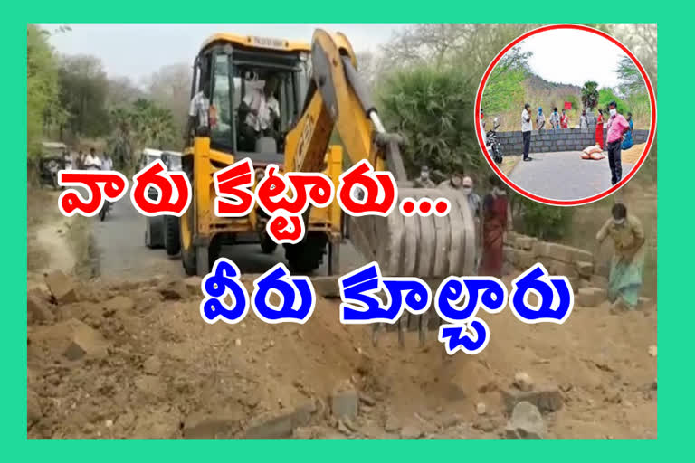 Chittoor district officials who demolished the walls built along the Tamil Nadu border