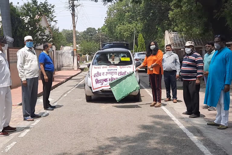 The General Manager of the Audience Factory and his wife flagged off the car going to deliver food