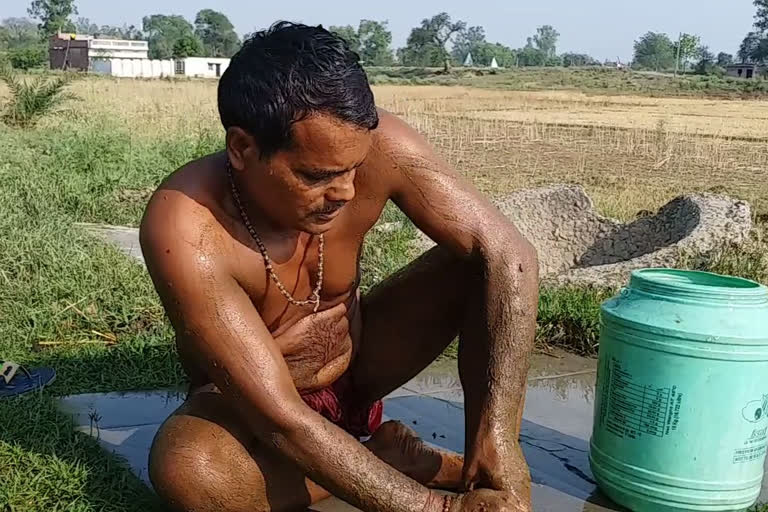 bath with cow dung