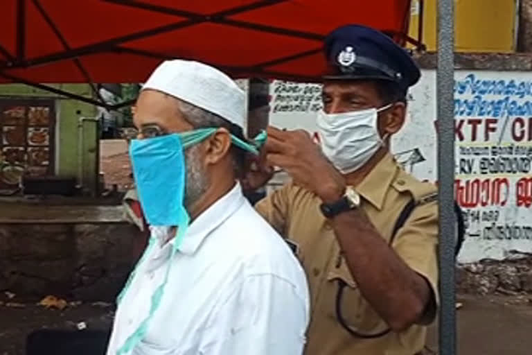 kerala mask mandatory  malappuram police  free mask  മലപ്പുറം മാസ്‌ക്  മലപ്പുറം കുന്നുമ്മല്‍ പൊലീസ്  മാസ്‌ക് പിഴ  മലപ്പുറം എസ്‌പി യു.അബ്‌ദുൽ കരീം  malappuram mask