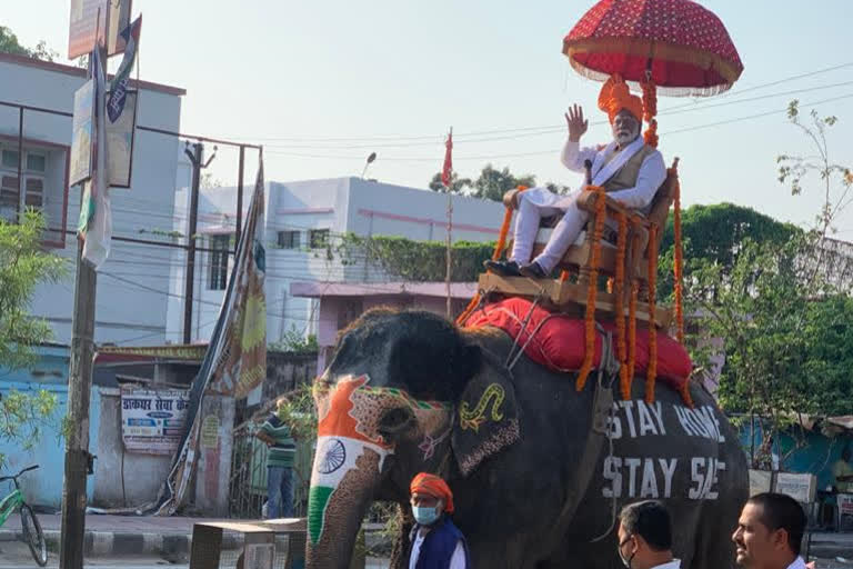 Modi's samefaces man woke people up on an elephant