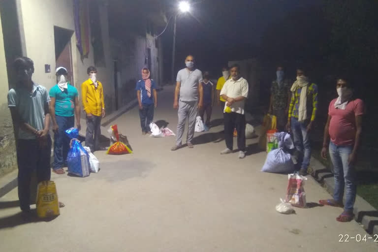 residents of prem nagar colony of najafgarh doing duty at their entry gates during lockdown