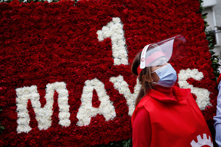 May Day marks pain, not celebration for workers hit by virus